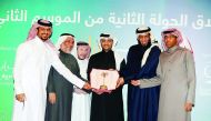 Officials of Qatar Charity and Holy Quran Radio during the launch of the second edition of the ‘Competitors’ programme. 
