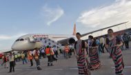 Air hostesses walk next to the parked Air India Boeing 787-800 Dreamliner upon its arrival at the airport in New Delhi, September 8, 2012. (Reuters / Mansi Thapliyal) 