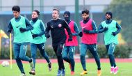 Qatar’s U23 players during a training session in Changzhou yesterday. 