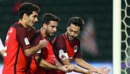 Al Rayyan’s Rodrigo Tabata (right) and team-mates celebrate a goal against Al Khor yesterday.  
