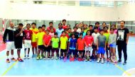 The podium winners at the New Vision Badminton Sport tournament pose for a picture at American Academy School, Al Thumama in Doha.  