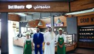 Officials and staff during the opening of the first Del Monte F&B store in Qatar at the airport. 