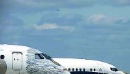 A Boeing 737 MAX and an Embraer E190-E2 are seen on the static display, before the opening of the 52nd Paris Air Show at Le Bourget airport near Paris, France, June 16, 2017. Reuters/Pascal Rossignol