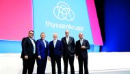 Heinrich Hiesinger (centre), chairman of the board of ThyssenKrupp, with board members Oliver Burkhard (left), Guido Kerkhoff (second left) and Donatus Kaufmann (second right), and Ulrich Lehner (right), chairman of the supervisory board, during the compa