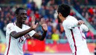 Qatar’s star striker Almoez Ali (L) celebrates scoring a goal at the AFC U-23 Asian Cup.
