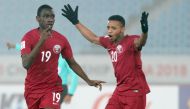 Qatar’s Salem Al Hajri (R) in action at the AFC U-23 Asian Cup.