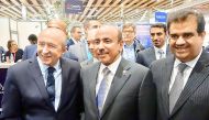 Minister of Transport and Communications H E Jassim bin Saif Al Sulaiti with other officials during the forum.