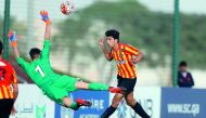 Action from the Al Kass Cup International match between Esperance Tunis and AC Milan at Aspire Academy training ground in Doha yesterday.