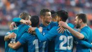 Real Madrid’s Toni Kroos celebrates scoring their fourth goal with teammates REUTERS/Heino Kalis