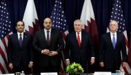 US Secretary of State Rex Tillerson (2nd R) and Defense Secretary Jim Mattis (R) pose with Qatari Foreign Minister Sheikh Mohammed bin Abdulrahman Al Thani (L) and Defense Minister Khalid bin Muhammad al-Attiyah before the opening session of the inaugural