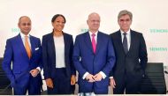 (L-R) Michael Sen, member of the board, Janina Kugel, Chief Human Resources Officer, Ralf P Thomas, CFO, and Joe Kaeser, CFO, pose during a press conference of the German industrial giant Siemens, ahead of the annual shareholder's meeting at the Olympic h