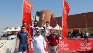 The podium winners at the fifth stage of the Royal Air Maroc Cycling League at Al Ruwais. 
