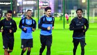 Al Sadd players in action during a training session on Sunday.