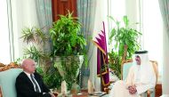 Emir H H Sheikh Tamim bin Hamad Al Thani with the Minister of Interior of the Republic of Italy, Marco Minetti, at the Emiri Diwan yesterday. 