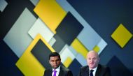 Australia's Commonwealth Bank CEO Ian Narev (R) briefs the media regarding the bank's half year result as chief financial officer Rob Jesudason (L) looks on in Sydney on February 7, 2018. AFP / Saeed Khan
