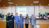 Vietnamese Ambassador Nguyen Dinh Thao (third left), Katara General Manager Dr Khalid bin Ibrahim Al Sulaiti (fourth left) and other officials at the screening of “Yellow Flowers on the Green Grass” at Katara on Tuesday.