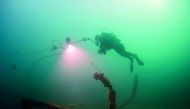 A team conducting maritime archaeology survey.