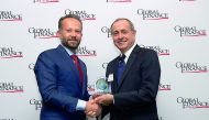 Chaouki Daher (left), General Manager and Head of Private Banking at ibq receiving award from a Global Finance official during a gala event held at ‘The Harvard Club’ in New York City.