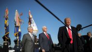 Donald Trump speaks to reporters as he arrives for a meeting at the Pentagon, accompanied by Defense Secretary Jim Mattis,  VP Mike Pence in Arlington, Virginia, January 18, 2018. Reuters/Carlos Barria