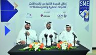 FROM LEFT: Rashid bin Ali Al Mansoori, CEO of Qatar Stock Exchange; Abdulaziz bin Nasser Al Khalifa, QDB CEO; and Saleh bin Hamad Al Sharqi, Director General of Qatar Chamber; during the press conference at QDB main office yesterday. Pic: Baher Amin/ The 