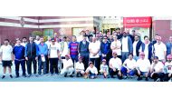 QIIB’s CEO Dr Abdulbasit Ahmad Al Shaibei and senior executive managers of the bank and staff members during the National Sport Day activities, yesterday.