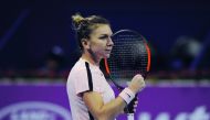 World number two Simona Halep of Romania, celebrates after winning her match against to Catherine Bellis of USA, during their match in the Qatar Total Open 2018 at the Khalifa Tennis and Squash Complex in Doha yesterday.  Pic: Salim Matramkot/The Peninsul