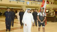 Lieutenant Colonel Mohammed Radi Al Hajri, Director of Media and Traffic Awareness, with other officials, receiving Omani traveller, Bader Al Qataity, at the General Directorate of Traffic headquarters recently. 