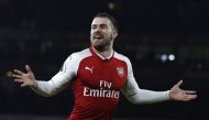 In this file photo taken on February 03, 2018 Arsenal's Welsh midfielder Aaron Ramsey celebrates scoring the team's fifth goal during the English Premier League football match between Arsenal and Everton at the Emirates Stadium in London on February 3, 20