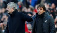 Manchester United manager Jose Mourinho with Chelsea manager Antonio Conte after the match REUTERS/Andrew Yates 
