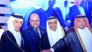 FROM LEFT: Minister of Finance H E Ali Shereef  Al Emadi, Ryan Gliha, Chargé d’Affaires, US Embassy; Minister of Justice H E Dr Hassan Lahdan Saqr Al Mohannadi, and Ambassador Ibrahim Fahkroo cutting cake at the US National Day celebrations, yesterday. 