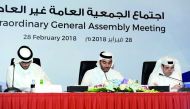 The Vice-Chairman of Mannai Corporation, Sheikh Suhaim bin Abdulla bin Khalifa Al Thani (centre), with other members of the board of directors, attending at the Extraordinary General Assembly held at the InterContinental Hotel in Doha yesterday. Pic: Sali