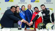 Joe Lahoud (fourth left), Group CEO, Marzooq Shamlan Al Shamlan Holding; with (from left) Saju Eapen, Retail Manager, Q-Tire; Carine Nehme Kassis, Group Marketing and Communication Director of Marzooq Shamlan Al Shamlan Holding; Nada Zeidan, Rally Driver;