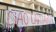 A giant banner reading 
