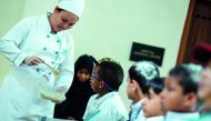 Schoolchildren participate in the healthy food and nutrition awareness programme organised  at Msheireb Museums as part of this year’s Qatar International Food Festival.