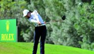 A player from the Asia-Pacific team in action at the Patsy Hankins Trophy 2018 at Doha Golf Club yesterday. Photo: Kammutty VP/THE PENINSULA