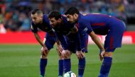 March 4, 2018 (L - R) Barcelona’s Jordi Alba, Lionel Messi and Luis Suarez prepare to take a free kick REUTERS/Juan Medina
