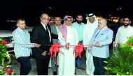 Abdulrahman Mohammed Khalifa Al Attiyah opening the showroom on Salwa Road along with Samir Azzam, Abdul Rahman Al Emadi, Osman Al Asmar, Mohammed Al Zuabi, Eng Mohammed Hassan, Hani Al Sayed and other dignitaries.