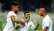 Al Markhiya players celebrate a goal against Al Ahli during their QSL game on Saturday at Al Ahli Stadium. Picture: Abdul Basit/The Peninsula