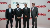 Ooredoo and Software AG officials.