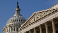 FILE PHOTO: The U.S. Capitol Dome (L) building is pictured in Washington, DC, U.S. on October 4, 2013. REUTERS/Jonathan Ernst
