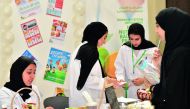 Dietitians advising visitors on the salt content in their daily diet.