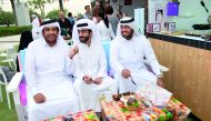 The members of Nama Center at its stall at the ninth annual Qatar International Food Festival 2018 at the Sheraton Hotel Park.