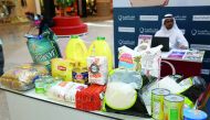 Food items collected under food basket campaign launched by QC for workers in Qatar.