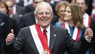 Peru's president Pedro Pablo Kuczynski walks to the Government Palace after swearing-in at the Congress in Lima on July 28, 2016. (AFP) 