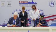 Deputy Prime Minister and Minister of State for Defence Affairs H E Dr Khalid bin Mohamed Al Attiyah (right, standing) and Italian Minister of Defence, Roberta Pinotti (left, standing) witnessing the signing of an agreement between Qatar Air Force and Ita