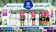 Minister of Administrative Development, Labour and Social Affairs, H E Dr Issa bin Saad Al Jafali Al Nuaimi  and Secretary-General of the Supreme Committee for Delivery & Legacy, Hassan Al Thawadi, with officials and referees during the final of Workers’ 