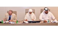 From left: Dr Simon Milne, Director of Royal Botanic Garden Edinburgh (RBGE), Fatma Saleh Al Khulaifi, Quranic Botanic Garden Manager, and  Dr Rashid Al Kuwari, Dean of Qatar University College of Arts and Sciences (QU-CAS) signing the MoU.