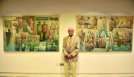 Renowned Iraqi artist Saadi Al Kaabi with some of his works at the opening of “Discourse of Silence” exhibition at Al Markhiya Gallery, at Fire Station, yesterday. Pic: Baher Amin / The Peninsula
