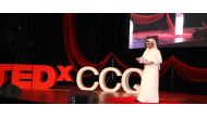 A speaker addressing the TEDxCCQ conference.