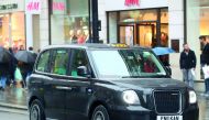 A London Electric Vehicle Company (LEVC) TX electric black taxi driving on the streets of central London, Britain, April 2, 2018. Reuters/Hannah McKay